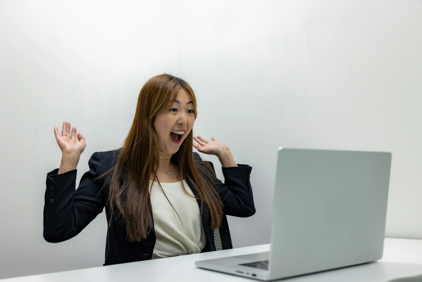 Professional reacting excitedly during a virtual careers conversation